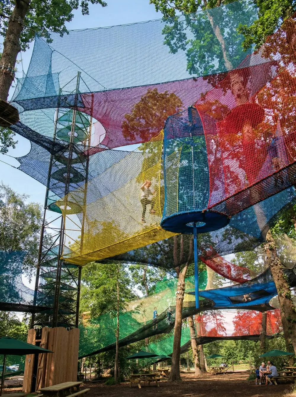 Net Adventure park — guests exploring high-tension aerial netting