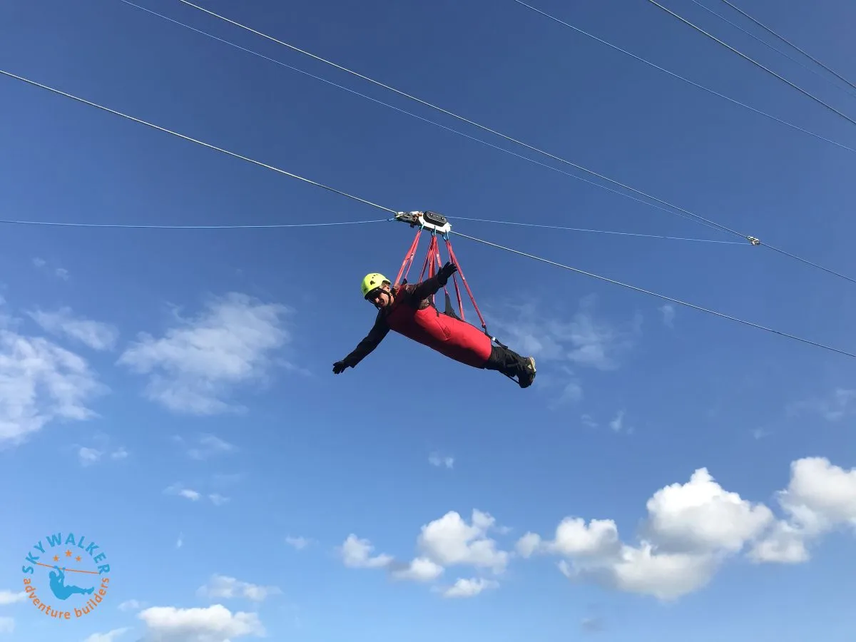 Magnetic zipline trolley with integrated eddy current brake